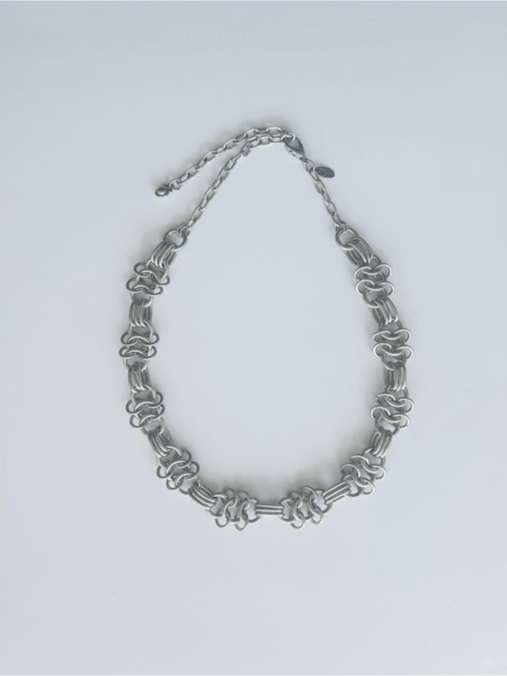 MYKA Metal Silver-Tone Statement Chain Link Necklace, Knot Motifs, Women Jewelry